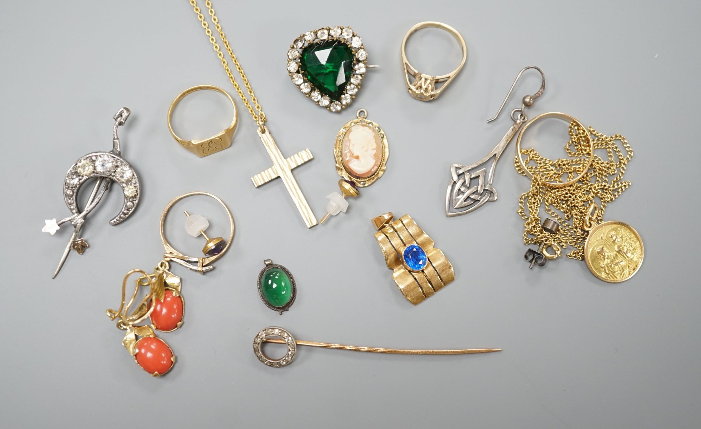 Assorted small jewellery including two 9ct rings, a 9ct cross pendant on a gilt metal chain, (9ct 5.3 grams), and 18ctgold signet ring, 2.5 grams, a 14k pendant. gross 2.2 grams, a continental yellow metal pendant and ri